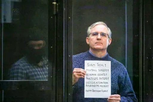 Paul Whelan, a former U.S. Marine who was arrested for alleged spying, listens to the verdict in a courtroom at the Moscow City Court in Moscow, Russia, June 15, 2020. (Sofia Sandurskaya, Moscow News Agency photo via AP)