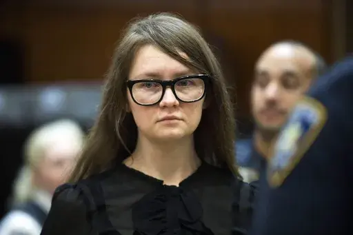 Anna Sorokin, who claimed to be a German heiress, returns to the courtroom during her trial on grand larceny and theft of services charges, April 25, 2019, in New York. (AP Photo/Mary Altaffer, File)