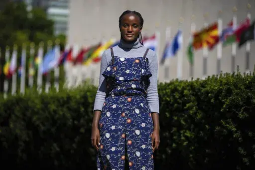 Climate activist Vanessa Nakate of Uganda poses for a portrait in New York outside the United Nations headquarters, Wednesday, Sept. 14, 2022. Nakate was appointed to serve as this year's UNICEF Goodwill Ambassador. (AP Photo/Robert Bumsted)