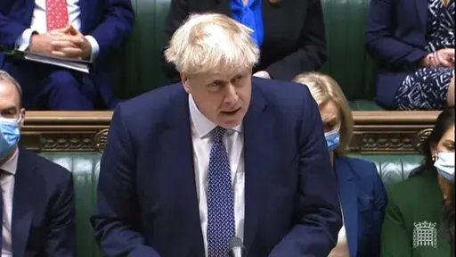 In this grab taken from video, Britain's Prime Minister Boris Johnson makes a statement ahead of Prime Minister's Questions in the House of Commons, London, Wednesday,  Jan. 12, 2022.  Johnson has apologized for attending a garden party during Britain’s coronavirus lockdown. He said Wednesday that there are things the government “did not get right.” Johnson is facing anger from public and politicians over claims he and his staff flouted pandemic restrictions by socializing when it was bann