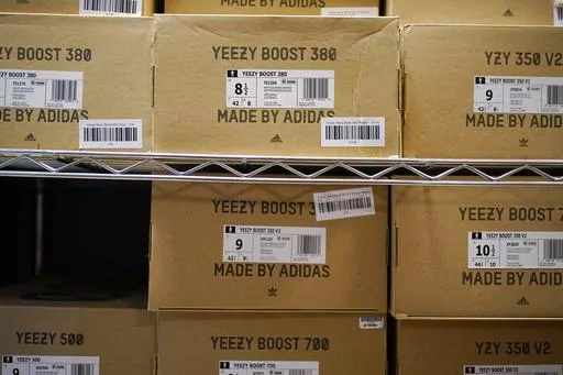 Boxes containing Yeezy shoes made by Adidas are seen at Laced Up, a sneaker resale store, in Paramus, N.J., Tuesday, Oct. 25, 2022. Adidas saw operating earnings dwindle in the first three months of the year as the German sportswear company's breakup with the rapper formerly known as Kanye West and his popular Yeezy shoe brand cost it 400 million euros ($441 million) in lost sales. Profit was down to 60 million euros from 437 million euros in the same quarter a year ago, while profit margin shra