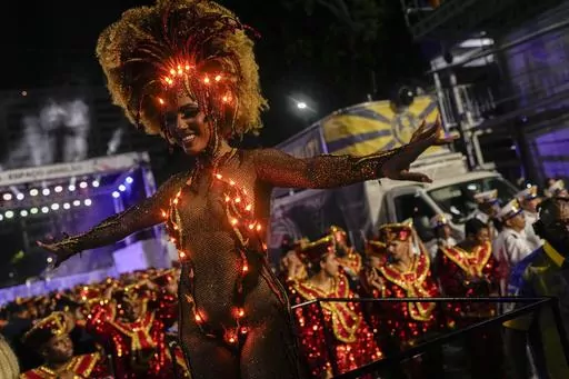 Drum queen Mayara Lima from Paraiso do Tuiuti samba school performs during Carnival celebrations at the Sambadrome in Rio de Janeiro, Brazil, Tuesday, Feb. 13, 2024. (AP Photo/Silvia Izquierdo)