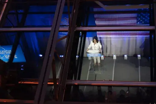 New York Gov. Kathy Hochul is seen reflected on a glass ceiling while speaking during her primary election night party, Tuesday, June 28, 2022, in New York. (AP Photo/Mary Altaffer)