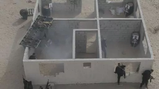 This image from video posted to social media by Hamas on Sept. 12, 2023 shows a live-fire exercise dubbed operation “Strong Pillar” outside Al-Mawasi, a Palestinian town on the southern coast of the Gaza Strip. (Hamas via AP)