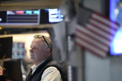 Traders work on the floor at the New York Stock Exchange in New York, Wednesday, May 1, 2024. (AP Photo/Seth Wenig)