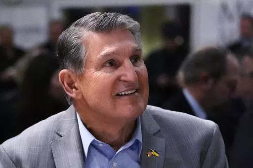 Sen. Joe Manchin, D-W.Va., smiles while being introduced during the 'Politics and Eggs' event, as part of his national listening tour, Friday, Jan. 12, 2024, in Manchester, N.H. As his second term ends as a U.S. senator, Manchin is still not a declared candidate for any office five months before the 2024 general election. But there’s still time to mull potential runs for governor, the Senate, and even the U.S. presidency. (AP Photo/Charles Krupa, File)