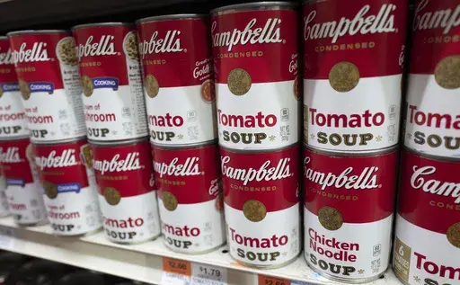 Cans of Campbell's soup are displayed in a supermarket, March 25, 2021, in New York. (AP Photo/Mark Lennihan, File)