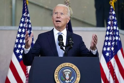 FILE - President Joe Biden delivers a speech on voting rights at the National Constitution Center, on July 13, 2021, in Philadelphia. Biden often talks about how the U.S. must show democracies can deliver, but he has done little to press the case for voting rights, other than a speech in Philadelphia. The anniversary will bring this issue back to the forefront, and it remains a central challenge for the president. (AP Photo/Evan Vucci, File)