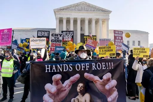 Abortion rights advocates and anti-abortion protesters demonstrate in front of the U.S. Supreme Court, Dec. 1, 2021, in Washington. There's action on abortion policy in rulings, legislatures, and campaigns for candidates and ballot measures on the 51st anniversary of Roe v. Wade. The 1973 ruling established the right to abortion across the U.S. But things have been in flux since the U.S. Supreme Court overturned it in 2022. (AP Photo/Andrew Harnik, File)