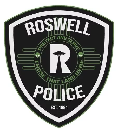 This image provided by the Roswell Police Dept. shows the new uniform patch. Famous for being the spot where a spacecraft purported crashed in 1947, Roswell, New Mexico, has become a mecca for people fascinated by extraterrestrial phenomenon. So it's only fitting that the city’s police force has uniform patches that are out of this world. The new patch was unveiled on Friday, March 8, 2024. (Roswell Police Dept. via AP)