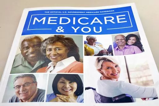 In this Nov. 8, 2018 file photo, the U.S. Medicare Handbook is photographed in Washington. Many people choose Medicare Advantage plans without exploring their options or noticing what changes their plan may have made, according to research. But now that a new year has started, you may realize you picked the wrong plan during Medicare’s fall open enrollment. (AP Photo/Pablo Martinez Monsivais)