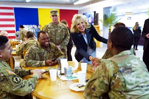 First lady Jill Biden meets U.S. troops during a visit to the Mihail Kogalniceanu Air Base in Romania, Friday, May 6, 2022. (AP Photo/Susan Walsh, Pool)