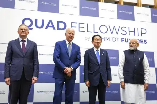 From left, Australian Prime Minister Anthony Albanese, U.S. President Joe Biden, Japanese Prime Minister Fumio Kishida and Indian Prime Minister Narendra Modi attend the Japan-U.S.-Australia-India Fellowship Founding Celebration event in Tokyo Tuesday, May 24, 2022. (Yuichi Yamazaki/Pool Photo via AP)