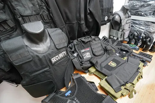 Different levels of body armor sit on display at 221B Tactical headquarters, Tuesday, June 14, 2022, in New York. (AP Photo/Mary Altaffer)
