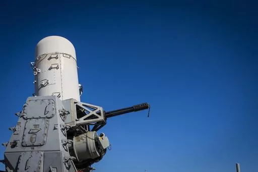 A 20mm Phalanx CIWS weapons defense cannon is mounted on the U.S. Navy destroyer USS Gravely on March 14, 2023. The U.S. military said Sunday Dec. 31, 2023 it shot down two anti-ship ballistic missiles fired toward a container ship by Yemen’s Houthi rebels in the Red Sea. A contract-embarked security team on the ship returned fire, the central command said. U.S. helicopters from the USS Dwight D. Eisenhower aircraft carrier and GRAVELY responded to the distress call and while issuing verbal wa