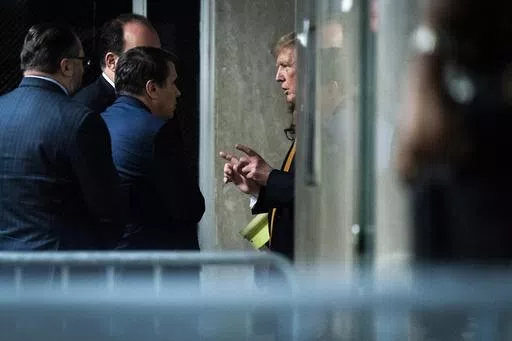 Former President Donald Trump speaks with attorney Todd Blanche and staff outside of the courtroom as jurors began deliberations for his criminal trial at Manhattan Criminal Court in New York on Wednesday, May 29, 2024. Trump was charged with 34 counts of falsifying business records last year, which prosecutors say was an effort to hide a potential sex scandal, both before and after the 2016 presidential election. Trump is the first former U.S. president to face trial on criminal charges. (Jabin