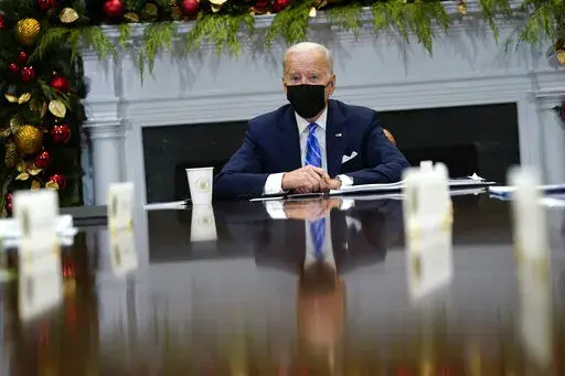 President Joe Biden speaks as he meets with members of the White House COVID-19 Response Team in the Roosevelt Room of the White House in Washington, Thursday, Dec. 16, 2021. (AP Photo/Susan Walsh)