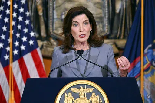 New York Gov. Kathy Hochul speaks to reporters about legislation passed during a special legislative session, in the Red Room at the state Capitol, July 1, 2022, in Albany, N.Y. New York state is rolling out a novel strategy to screen applicants for gun permits by requiring people seeking to carry concealed handguns to hand over their social media accounts for a review of their "character and conduct." (AP Photo/Hans Pennink, File)