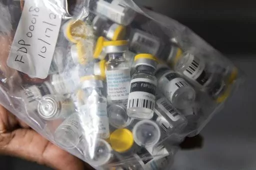 Vials of single doses of the Jynneos vaccine for monkeypox are seen from a cooler at a vaccinations site on Aug. 29, 2022, in the Brooklyn borough of New York. As Congo copes with its biggest outbreak of mpox, scientists warn discrimination against gay and bisexual men on the continent could make it worse. (AP Photo/Jeenah Moon, File)