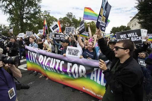 Supporters of LGBTQ rights stage a protest on the street in front of the U.S. Supreme Court on Oct. 8, 2019, in Washington. In a victory for the transgender community, and bucking the trend of other reliably red states, a Republican-controlled Louisiana legislative committee voted to a kill a bill Wednesday, May 24, 2023, that would have banned gender-affirming medical care for minors. (AP Photo/Manuel Balce Ceneta, File)