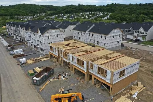 Townhomes under construction are shown in Mars, Pa., on May, 27, 2022. On Thursday, Freddie Mac reports on this week's average U.S. mortgage rates. (AP Photo/Gene J. Puskar, File)