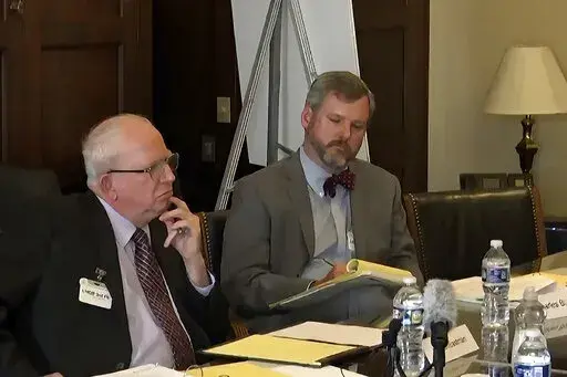 In this image from video released by the House Select Committee, John Eastman, a lawyer for former President Donald Trump, appears during a video deposition to the House select committee investigating the Jan. 6 attack on the U.S. Capitol at the hearing June 16, 2022, on Capitol Hill in Washington. Eastman says in a federal court filing that FBI agents have seized his cell phone. (House Select Committee via AP)