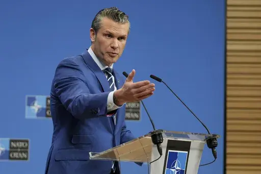 Defense Secretary Pete Hegseth speaks during a media conference at NATO headquarters in Brussels, Feb. 13, 2025. (AP Photo/Virginia Mayo, File)