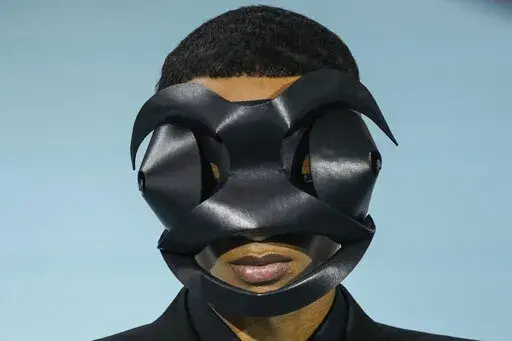 A model wears a creation for the Louis Vuitton fall-winter 22/23 men's collection, in Paris, Thursday, Jan. 20, 2022. (AP Photo/Francois Mori)