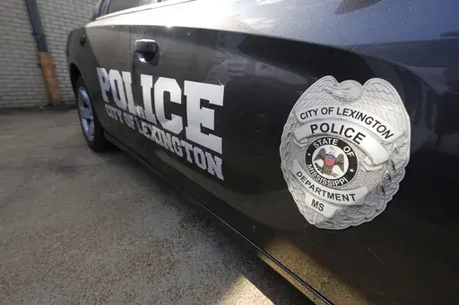 A Lexington, Miss., police cruiser is parked outside their facility near the town square, Aug. 15, 2022. (AP Photo/Rogelio V. Solis, File)