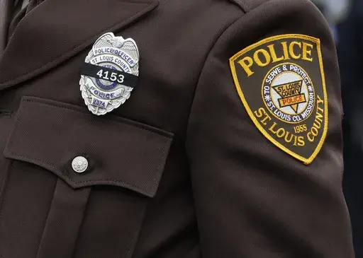 A St. Louis County Police Department badge is seen, Oct. 13, 2016, in Chesterfield, Mo. (AP Photo/Jeff Roberson, File)
