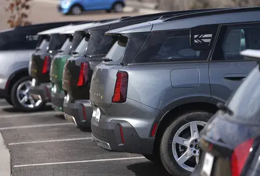Unsold 2025 Countryman utility vehicles sit on display at a Mini dealership Sunday, March 23, 2025, in Highlands Ranch, Colo. (AP Photo/David Zalubowski)