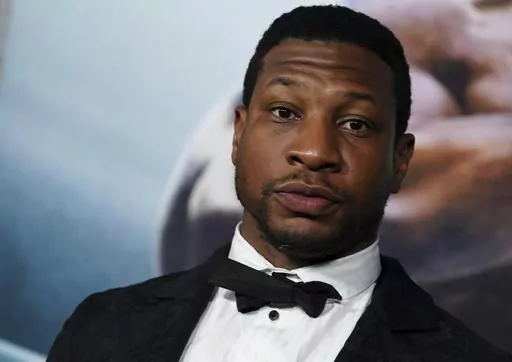Jonathan Majors arrives at the premiere of "Creed III" on Feb. 27, 2023, at TCL Chinese Theatre in Los Angeles. The arrest of actor Majors on Saturday, March 25, 2023, has upended the Army’s newly launched advertising campaign that was aimed at reviving the service’s struggling recruiting numbers. (Photo by Jordan Strauss/Invision/AP, File)
