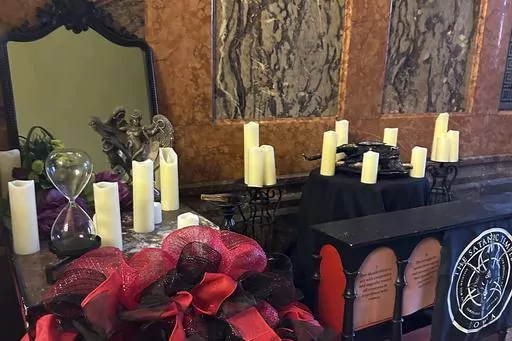 A damaged Satanic display is shown at the Iowa state Capitol on Dec. 15, 2023, in Des Moines, Iowa. A Mississippi man who admitted to destroying a statue of a pagan idol at Iowa’s state capitol has been charged with a hate crime. The statue was brought to the capitol by the Satanic Temple of Iowa under state rules allowing religious displays in the capitol during the holidays. The move drew strong criticism from state and national leaders. On Dec. 14, the figure depicting the horned deity Baph