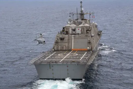 An MQ-8B Fire Scout unmanned aerial vehicle assigned to the Black Knights of Helicopter Sea Combat Squadron (HSC) 22 conducts flight operations during an underway with the USS Milwaukee (LCS 5) on June 27, 2019 in the Atlantic Ocean. The ship remains in port at Naval Station Guantanamo Bay in Cuba, with about two dozen sailors, or nearly a quarter of its crew, testing positive for COVID-19, according to U.S. defense officials.(Mass Communication Specialist 2nd Class Anderson W. Branch/U.S. Navy 