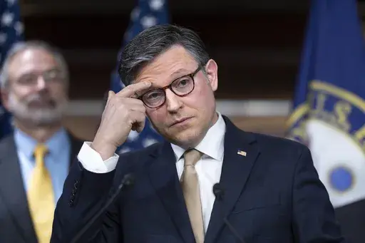 Speaker of the House Mike Johnson, R-La., meets with reporters as House Republicans push ahead with a go-it-alone strategy on an interim GOP spending bill that would keep federal agencies funded through Sept. 30, at the Capitol, in Washington, Tuesday, March 11, 2025. (AP Photo/J. Scott Applewhite)