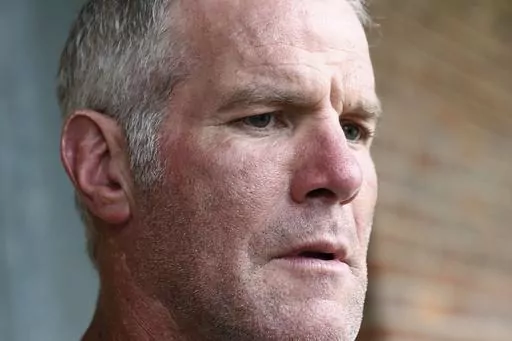 Former NFL quarterback Brett Favre speaks to the media in Jackson, Miss., Oct. 17, 2018. Favre will not be dismissed from a lawsuit that seeks to recover millions of dollars of misspent welfare money that was supposed to help some of the neediest people in the United States, a Mississippi judge ruled Monday, April 24, 2023. (AP Photo/Rogelio V. Solis, File)