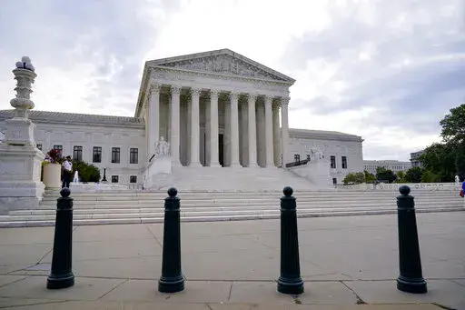 FILE - The Supreme Court is seen on the first day of the new term, in Washington, Oct. 4, 2021 photo.  (AP Photo/J. Scott Applewhite, File)
