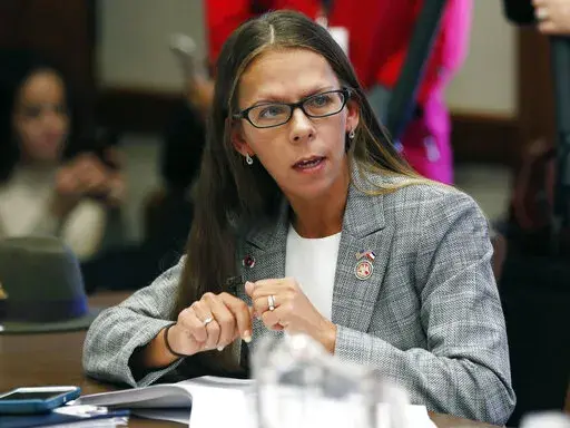House Education Committee member Ashley Henley, R-Southaven, asks a question about teacher pay raise legislation presented before the committee on Jan. 31, 2019, at the Capitol in Jackson, Miss. Billy Lamar Brooks has been indicted on a murder charge a year after the former Mississippi lawmaker was shot to death while she was doing yard work in a rural area where her sister-in-law had died.  (AP Photo/Rogelio V. Solis, File)