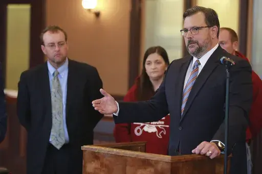 District Attorney John Weddle, right, speaks to reporters at the Pontotoc County Courthouse, in Pontotoc, Miss., Dec. 6, 2021. (Adam Robison/The Northeast Mississippi Daily Journal via AP, File)
