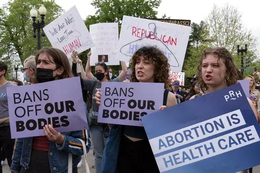 Demonstrators protest outside of the U.S. Supreme Court Tuesday, May 3, 2022 in Washington. A draft opinion suggests the U.S. Supreme Court could be poised to overturn the landmark 1973 Roe v. Wade case that legalized abortion nationwide, according to a Politico report released Monday. Whatever the outcome, the Politico report represents an extremely rare breach of the court's secretive deliberation process, and on a case of surpassing importance. (AP Photo/Jose Luis Magana)