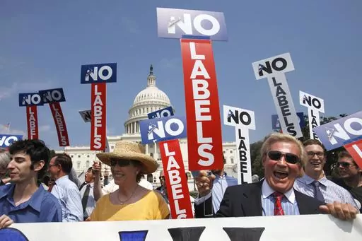 John Holman, of Denver, Colo., right, and others with the group "No Labels" take part in a rally on Capitol Hill in Washington, July 18, 2011. North Carolina voters could have another presidential ticket to choose from in 2024 now that state election officials have formally granted the “No Labels” movement a spot on the ballot. The State Board of Elections voted 4-1 on Sunday, Aug. 13, 2023, to recognize the No Labels Party as an official North Carolina party following a successful petition 