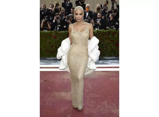 Kim Kardashian wears the iconic dress worn by Marilyn Monroe at The Metropolitan Museum of Art's Costume Institute benefit gala in New York on May 2, 2022.  Some Monroe enthusiasts believe the dress was damaged after Kardashian wore it but the Ripley’s Believe It or Not! attraction in Hollywood, Calif., where the garment is on display, denies that claim. (Photo by Evan Agostini/Invision/AP, File)