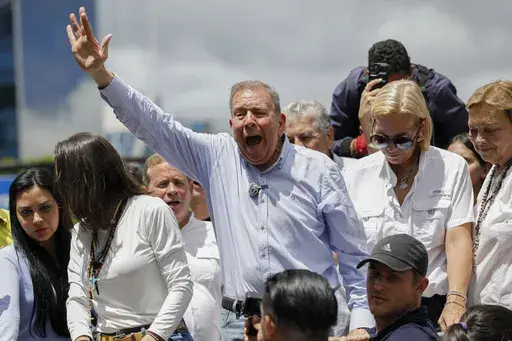 Opposition presidential candidate Edmundo Gonzalez leads a demonstration against the official election results that declared that President Nicolas Maduro won reelection in Caracas, Venezuela, July 30, 2024. (AP Photo/Cristian Hernandez, File)