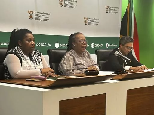 South African Foreign Minister Naledi Pandor, center, adresses a news conference in Pretoria, South Africa, Wednesday, Jan. 31, 2024. Pandor said that Israel has already ignored the ruling against it last week by the U.N.'s top court by killing hundreds more civilians in Gaza in a matter of days, while her country has also asked why an arrest warrant for Israeli Prime Minister Benjamin Netanyahu has not been issued in another case South Africa has brought at the separate International Criminal C