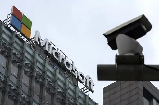 A security surveillance camera is seen near the Microsoft office building in Beijing, July 20, 2021. State-backed Chinese hackers have been targeting U.S. critical infrastructure and could be laying the technical groundwork for the potential disruption of critical communications between the U.S. and Asia during future crises, Microsoft said Wednesday, May 24, 2023. (AP Photo/Andy Wong, File)