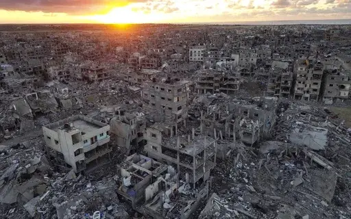 An aerial photograph taken by a drone shows the destruction caused by the Israeli air and ground offensive, in Rafah, Gaza Strip, Friday, Jan. 24, 2025. (AP Photo/Jehad Alshrafi)