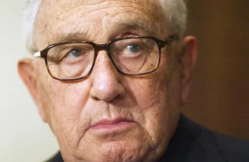 Former Secretary of State Henry Kissinger is seen during a meeting with President Vladimir Putin in the Novo-Ogaryovo residence outside Moscow, June 6, 2006. Kissinger, the diplomat with the thick glasses and gravelly voice who dominated foreign policy as the United States extricated itself from Vietnam and broke down barriers with China, died Wednesday, Nov. 29, 2023. He was 100. (AP Photo/Sergey Ponomarev, File)