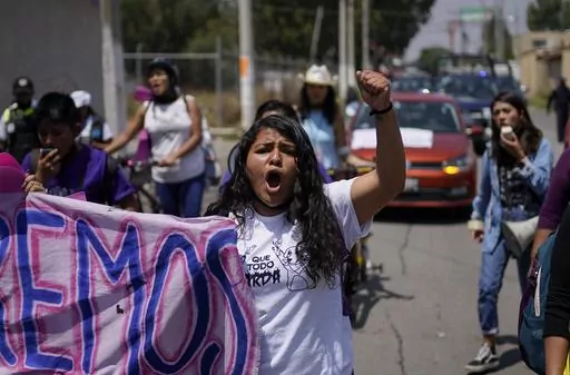 Roxana Ruiz shouts slogans during a march in memory of Diana Velazquez, who was making a call outside her home in 2017 when she was disappeared, raped and killed, in Chimalhuacan, State of Mexico, Mexico, July 2, 2022. Ruiz, who killed a man defending herself when he attacked and raped her in 2021 was sentenced to more than six years in prison, a decision her legal defense called “discriminatory” and vowed to appeal Tuesday, May 16, 2023.(AP Photo/Eduardo Verdugo, File)