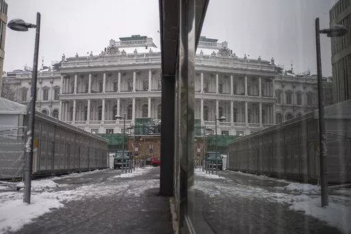 Palais Coburg where closed-door nuclear talks take place reflected in a window in Vienna, Austria, Thursday, Dec. 09, 2021. (AP Photo/Michael Gruber)