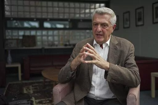 United Nations High Commissioner for Refugees Filippo Grandi speaks during an interview with The Associated Press at UNHCR headquarters in Geneva, Switzerland, Wednesday, Aug. 17, 2022. Grandi said Europe's embrace of millions of Ukrainians who fled Russia's invasion showed that it's possible to welcome large numbers of asylum-seekers, and the approach should be replicated to receive those fleeing other nations. (AP Photo/Renata Brito)